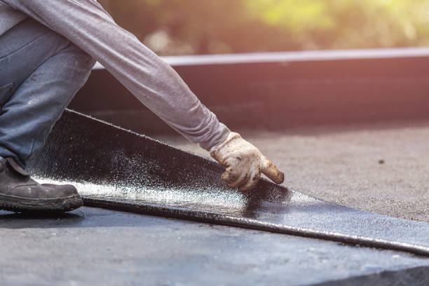 Professional Basement Waterproofing technician working in Chapel Hill, NC